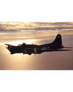 B-17 Flying Fortress Sally B over the North Sea at sunset – air-to-air photo by Russell Mason