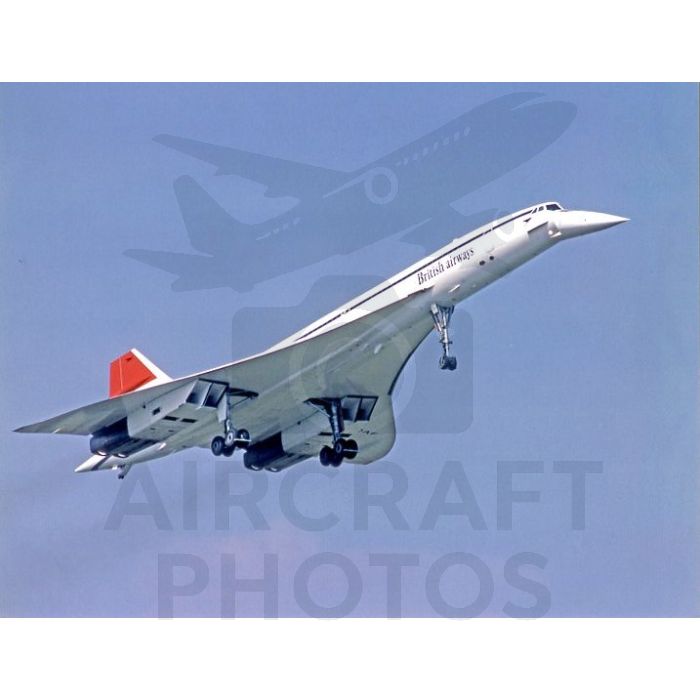 British Airways Concorde supersonic airplane in flight against a blue sky.