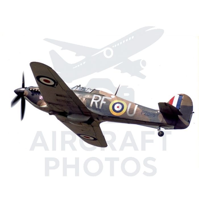 A WWII-era Supermarine Spitfire flying at an angle, showcasing its camouflage and roundel markings, with the registration RF-U visible on the side.